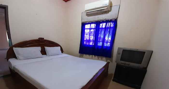 Kamar Tidur SPOT ON 91312 Kost Arfa