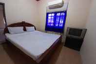 Kamar Tidur SPOT ON 91312 Kost Arfa