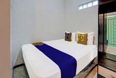 臥室 SPOT ON 91323 Omah Victoria Homestay & Culinary