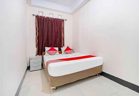 Bedroom OYO 91322 Jawara Guest House Syariah