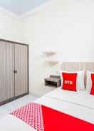 BEDROOM OYO 91332 City-m Urban Homestay Syariah