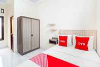 Kamar Tidur OYO 91332 City-m Urban Homestay Syariah