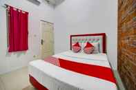 Kamar Tidur OYO 91173 Guesthouse King Puntodewo