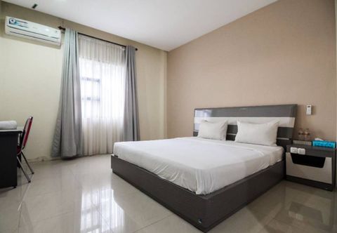 Bedroom OYO 91266 Markoni 18 Guest House