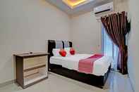 Bedroom OYO 91269 R&s Living Residence