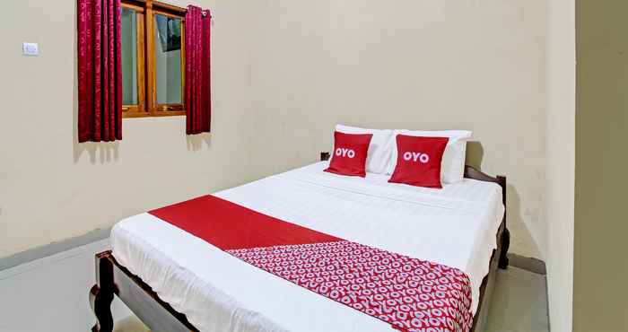 ห้องนอน OYO 91353 Hotel Surya Andesa