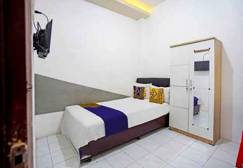 Bedroom SPOT ON 91360 Swk 68 Syariah