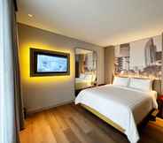 Phòng ngủ 5 Ra Suites Simatupang
