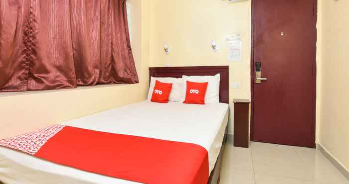 Kamar Tidur SUPER OYO 90562 J Hotel PJ