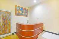 Lobi OYO 91351 87 Guest House