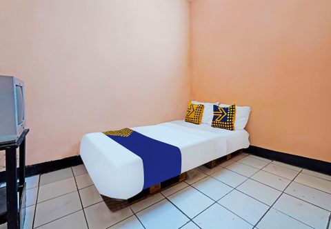 Bilik Tidur Hotel O Rumah Bundo Syariah