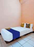 BEDROOM SPOT ON 91367 Rumah Bundo Syariah