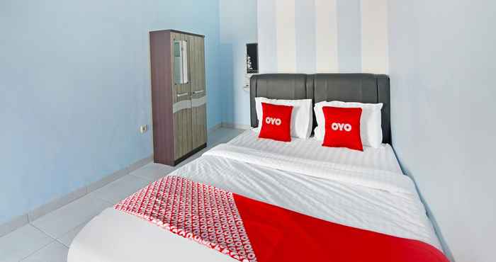 Bedroom OYO 91399 Homestay Trendy Syariah