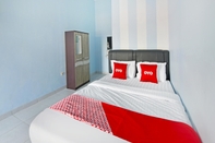 Bedroom OYO 91399 Homestay Trendy Syariah