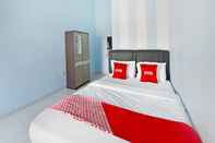 Bedroom OYO 91399 Homestay Trendy Syariah