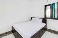 Bedroom SPOT ON 91383 Green Forest Homestay 