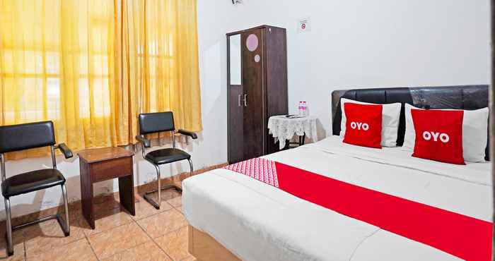 Bilik Tidur OYO 91390 Kost Grand Royal Elite