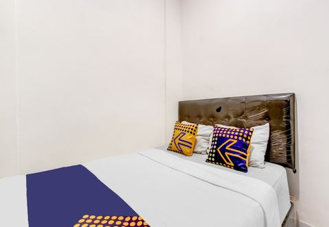 臥室 OYO Life 91374 Asia Stay Semarang Syariah