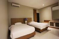 Kamar Tidur Heroes Hotel