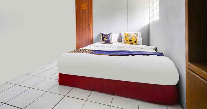 Kamar Tidur SPOT ON 91393 Budiluhur 10 Homestay