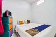 Bedroom SPOT ON 91386 De Jawara Homestay Syariah