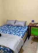 BEDROOM SPOT ON 91402 Home'59 Tegal Danas