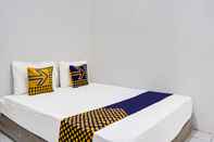 Bedroom SPOT ON 91403 Reva Residence Syariah 
