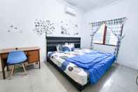 Bedroom Homey Guesthouse Kertajaya (Syariah)