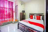 Bedroom OYO 91415 De Wijaya Hotel