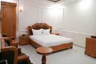 Bedroom Le Royal Hotel