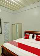 BEDROOM OYO 91434 Cek@n Guest House 