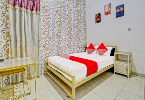 Bedroom OYO 91429 Butterfly Kost
