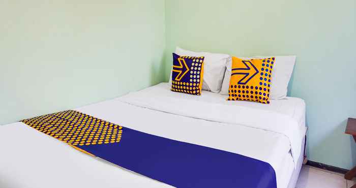 Kamar Tidur SPOT ON 91542 Hotel Emma