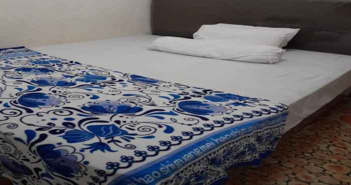 Kamar Tidur EXPRESS O 91477 Fazira Home Stay Syariah