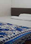 BEDROOM EXPRESS O 91477 Fazira Home Stay Syariah