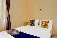 Kamar Tidur SPOT ON 91461 Saungawi Stay Syariah