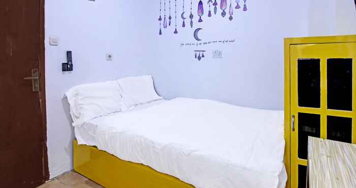 Phòng ngủ SPOT ON 91506 Kedai Cinta Guest House