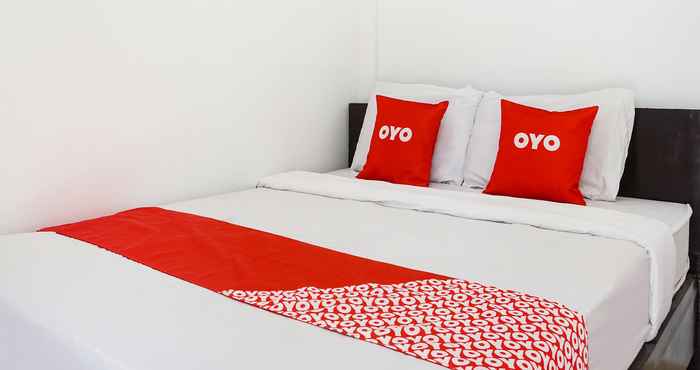 Phòng ngủ OYO 91544 Homestay Biru Blukid