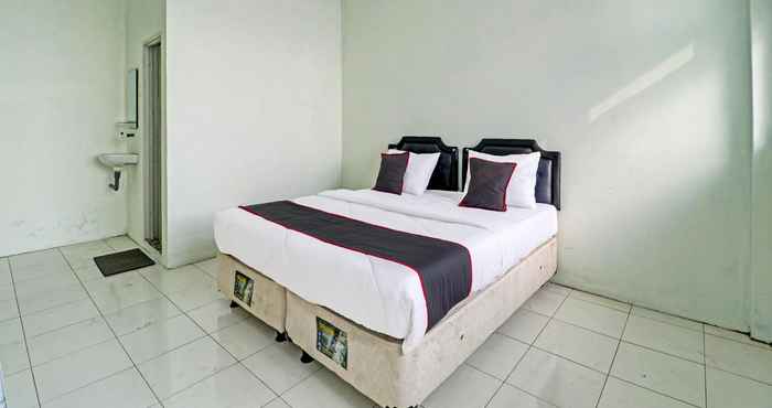 Phòng ngủ Capital O 91466 Hotel Neu Backpacker Tf Syariah (smk Tb)