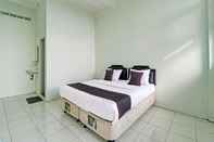 Phòng ngủ Capital O 91466 Hotel Neu Backpacker Tf Syariah (smk Tb)