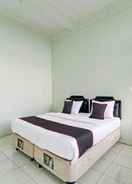 BEDROOM Capital O 91466 Hotel Neu Backpacker Tf Syariah (smk Tb)