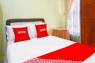 ห้องนอน OYO 91568 Trisna Srabah Resort Homestay & Resto