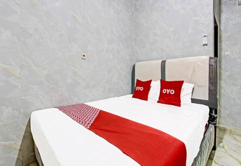 Kamar Tidur OYO 91475 Srikaya Hotel 2