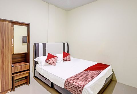 침실 Hotel O Suci Homestay SyariahNearKilas 7 TV