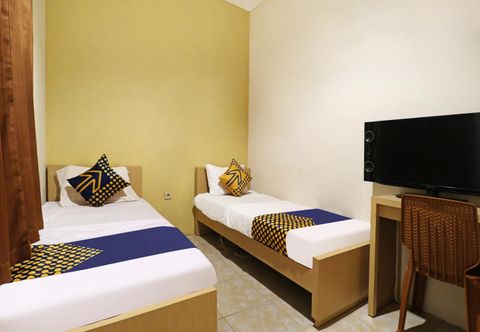 臥室 OYO Life 91504 De Vila Ungu Syariah