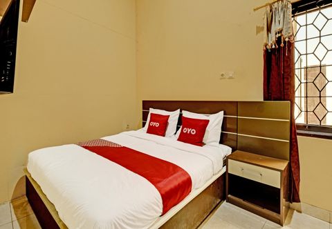 침실 OYO 91522 Candi Gebang Guesthouse