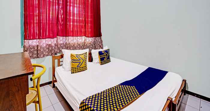 Kamar Tidur SPOT ON 91524 Victory Homestay Syariah