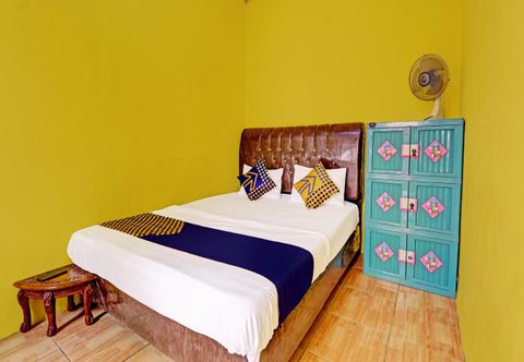 臥室 OYO Life 91478 Wisma Aura Syariah