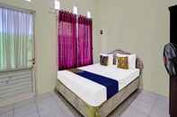 Bedroom SPOT ON 91595 Sruni Syariah