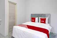 Bedroom OYO 91594 Bungah Residence Syariah